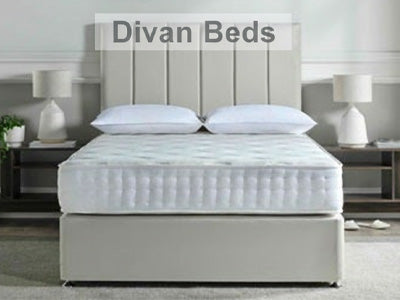 Divan bed with white mattress and pillows in a bedroom setting, labeled 'Divan Beds'.