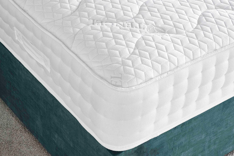 Close-up of Giltedge Sicily 1500 Mattress with a quilted surface on divan base