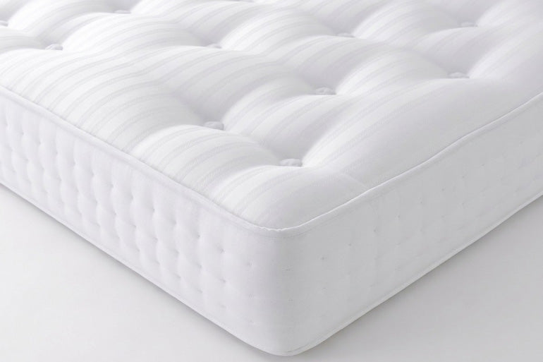 Corner view of Ultra Ortho 2000 Mattress on white background