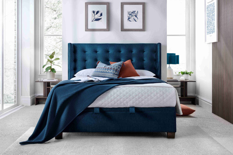 Kaydian Brunton Ottoman Bed in Ocean Blue in bedroom setting.