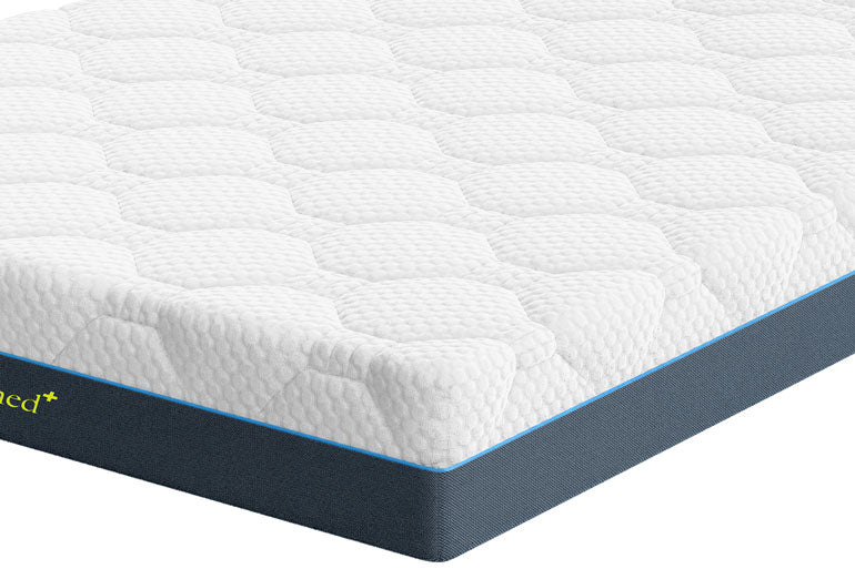 Close-up of Komfi Med Pro Mattress on white background.