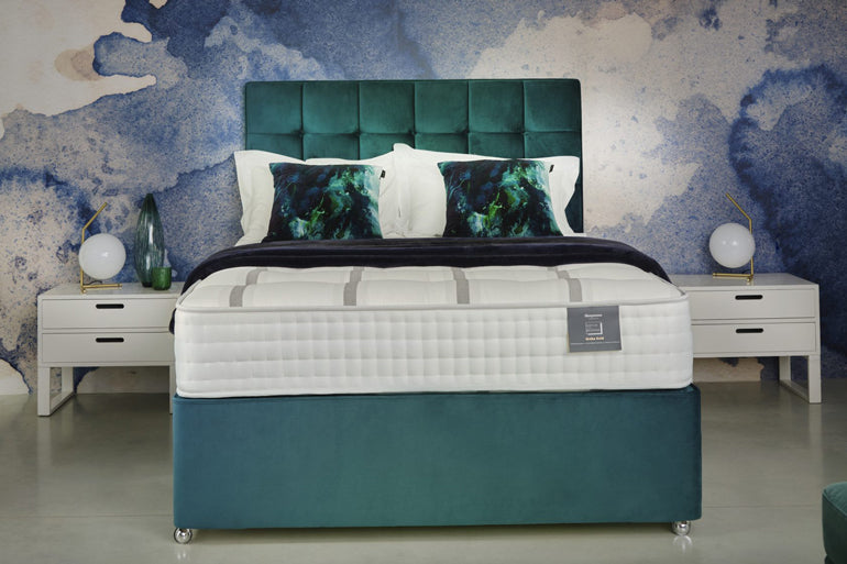 Sleepeezee Orthopaedic mattress on divan bed in bedroom setting