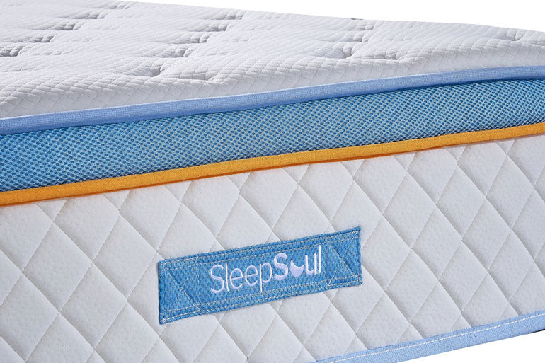 Close-up of Sleep Soul mattress with blue and orange accents on a white background