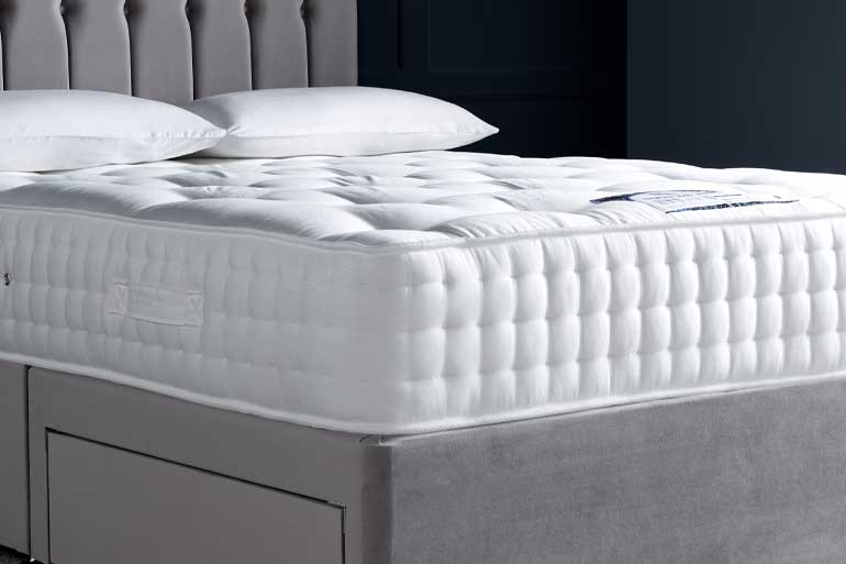 Close-up of Orthopaedic 2000 Pocket Sprung Mattress on divan base with headboard