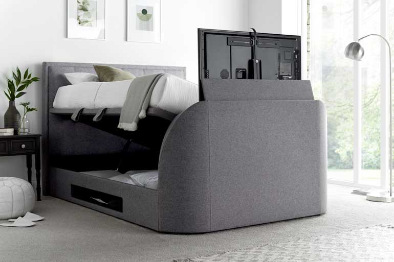 Kaydian Falstone | Falmer TV Ottoman Bed showing storage compartment open and TV up.