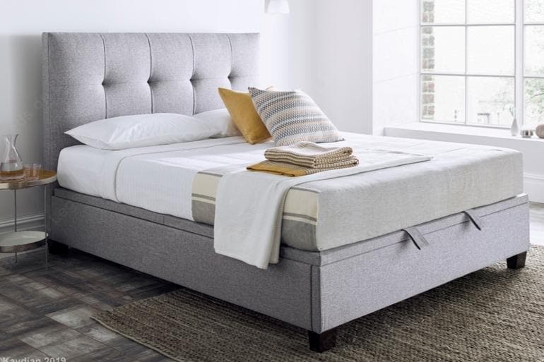 Kaydian Walkworth Ottoman Bed in Marbella Grey in bright bedroom.