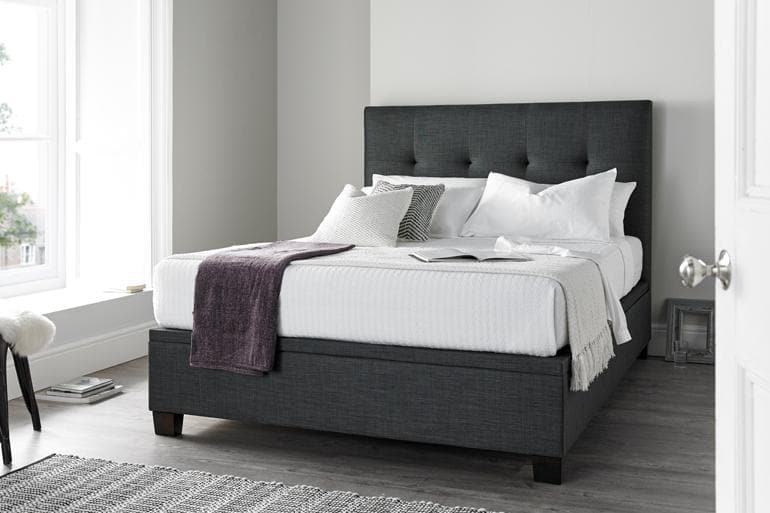 Kaydian Walkworth Ottoman Bed in Slate in a modern bedroom.