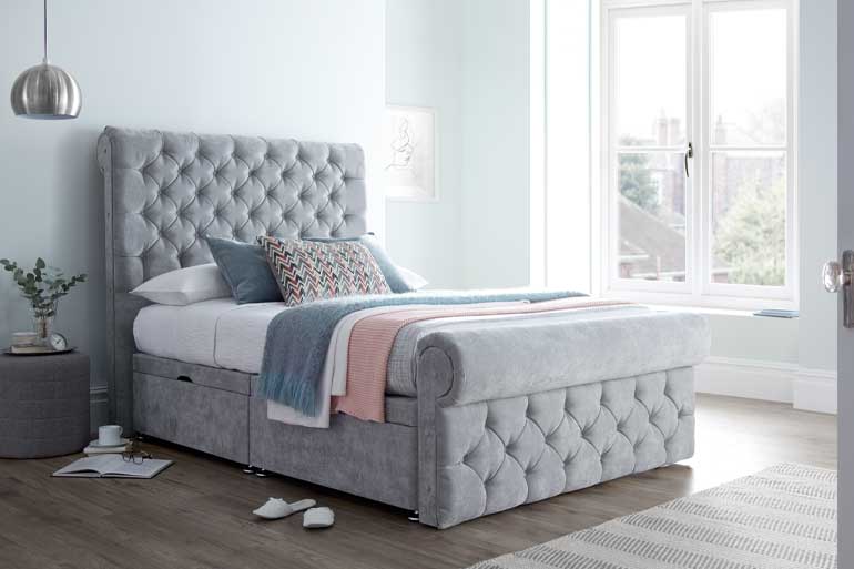 grey upholstered bed