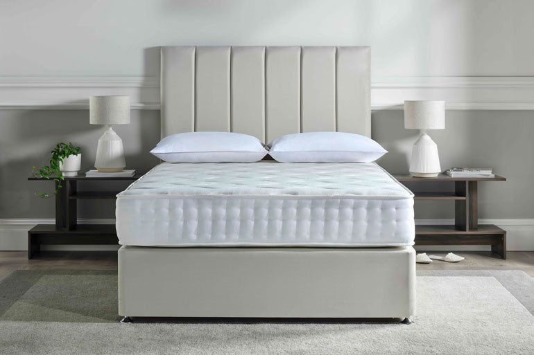 Deep Sleep Orion Mattress on divan base with headboard in bedroom setting 