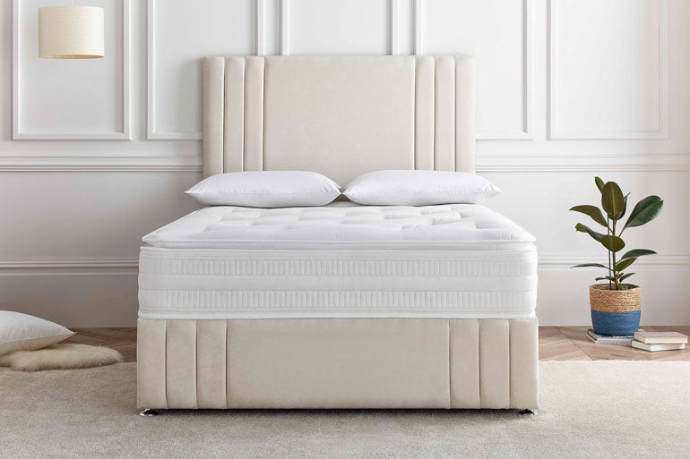 Deep Sleep Premier Rest 1000 Pillow-top Mattress on divan base with headboard in bedroom setting