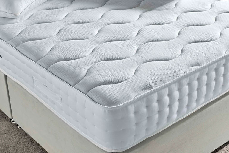 Corner view of Deep Sleep Orion Mattress on divan base