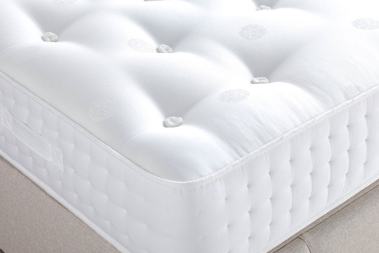 Corner view of Cotswold 1500 pocket sprung mattress with natural fillings