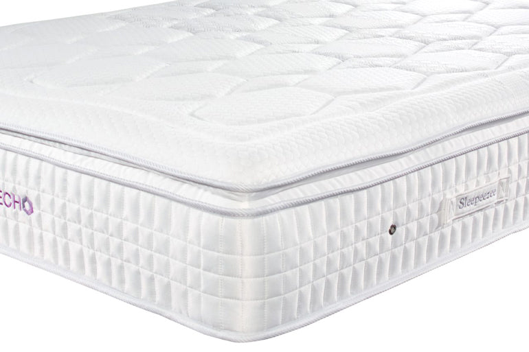 White mattress with 'Graphite echo' branding on a white background