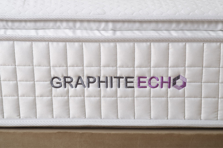 White mattress with 'Graphite Echo' branding on a plain background