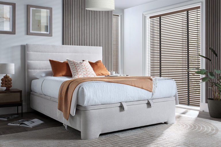 Kaydian Appleby Ottoman Bed in Maskat Clay in contemporary bedroom.