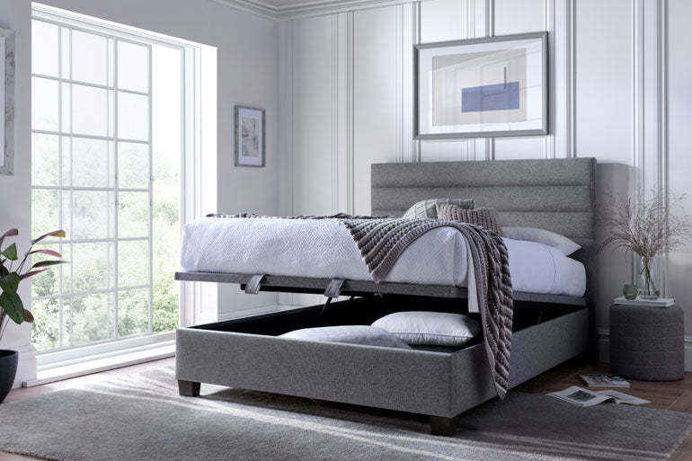 Kaydian Appleford Ottoman Bed with storage compartment in a bright bedroom.