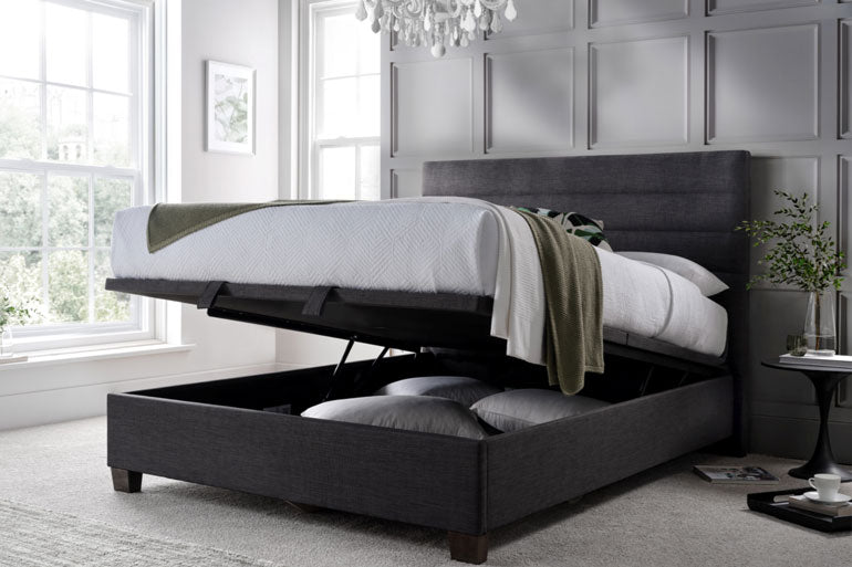 Kaydian Appleford Ottoman Bed in slate with storage compartment in a bedroom setting