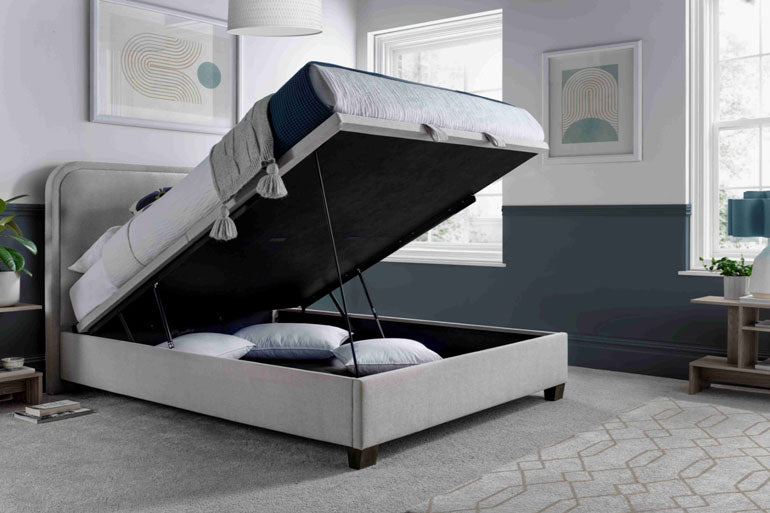 Kaydian Clifton Ottoman Bed in Maskat Clay showing the storage compartment open.