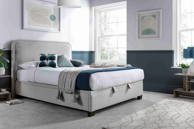 Side view of Kaydian Clifton Ottoman Bed in Maskat Clay in classy bedroom setting.