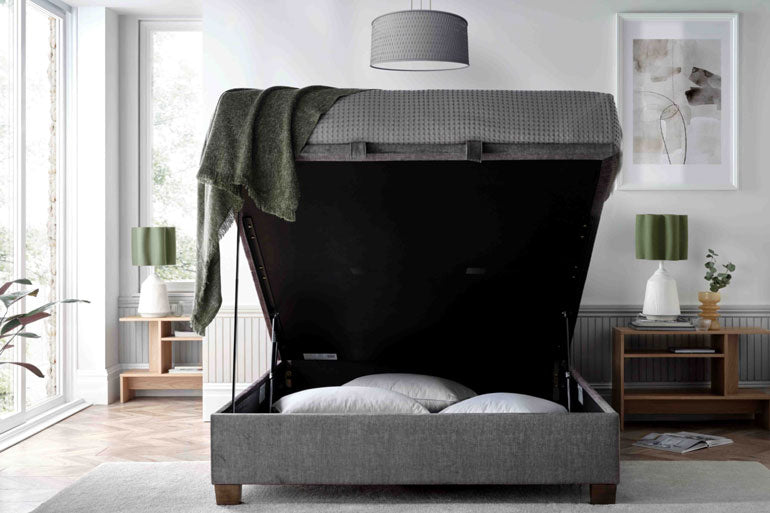 Kaydian Clifton Ottoman Bed in Vogue Grey with storage compartment open.