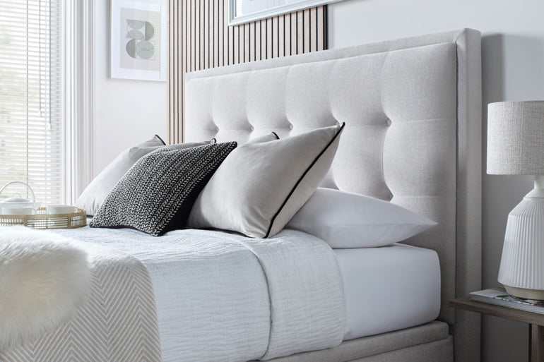 Close-up of Kaydian Falstone Ottoman Headboard in Maskat Clay.