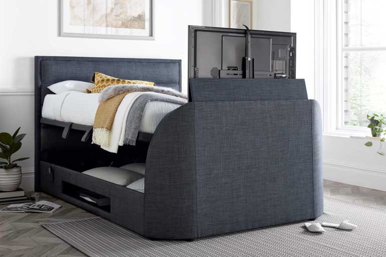 Kaydian Kirkby | Kirkley TV Ottoman Bed with TV compartment open in bedroom setting.