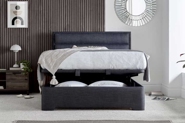 Kaydian Kirkby Ottoman Bed in Slate with storage compartment slightly open.