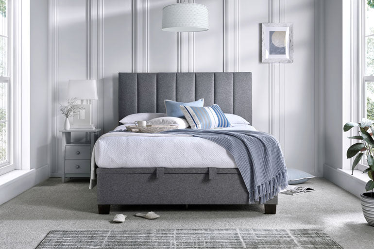 Kaydian Medlam Ottoman Bed in a bedroom setting with blue throw.