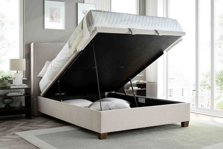 Kaydian Newton Ottoman Bed in Maskat Clay with storage compartment open.