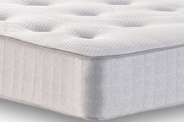Close-up of a Ortho pocket 1000 mattress with a light grey border.