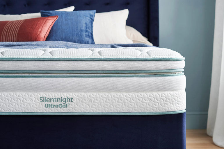 Silentnight UltraGel mattress on a bed with pillows in a bedroom setting