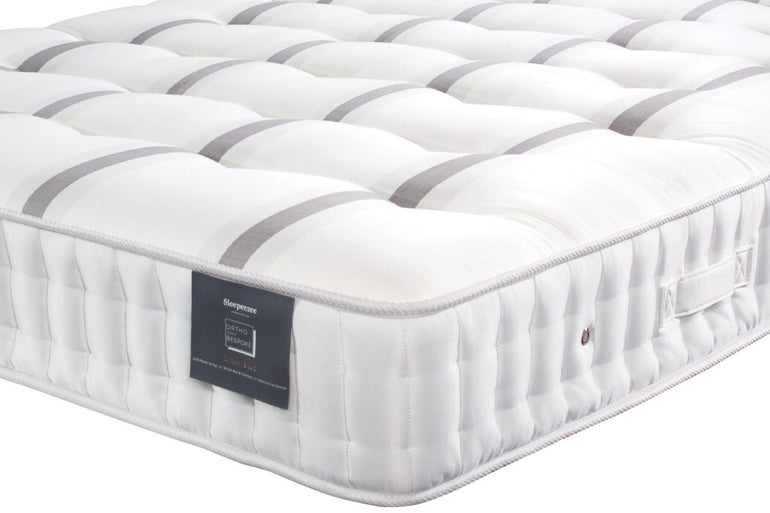 Corner view of Sleepeezee Ortho Bespoke Bronze Mattress on white background