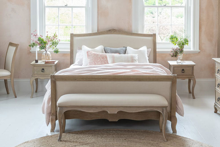 Willis & Gambier Camille High Foot End Bed in bedroom setting with bedsides and bench.