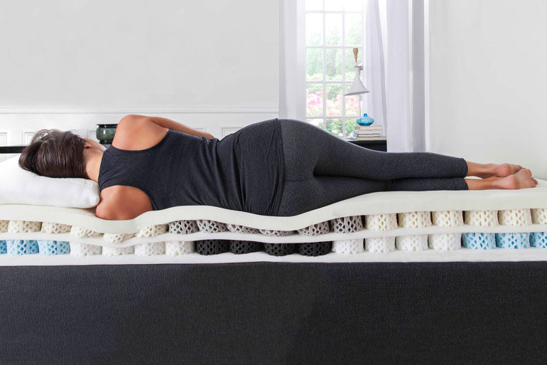 Woman sleeping on her side on Dormeo Octaspring 6500 Memory foam Mattress