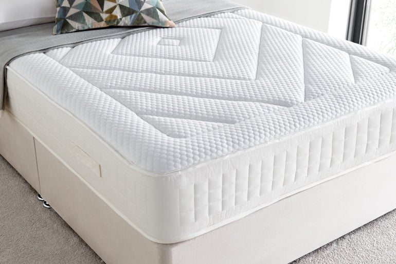Close-up of Giltedge Hybrid Gel Adapt 1000 Mattress on divan base