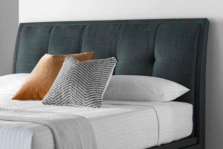 Close-up of Kaydian Accent Ottoman Headboard in Slate