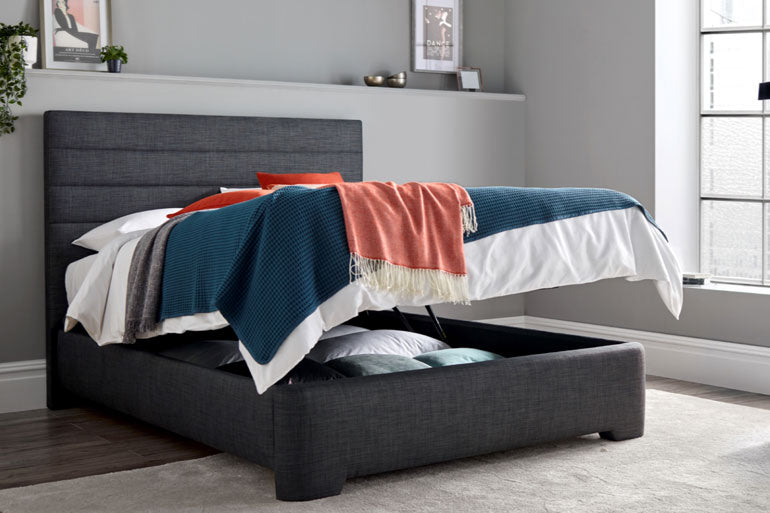 Kaydian Appleby Ottoman Bed in Slate in bedroom.